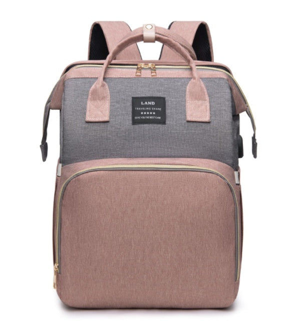 Diaper bag backpack with changing station – view 11